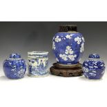 A Chinese blue and white export porcelain ginger jar, Kangxi period, painted with prunus, height