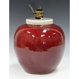 A Chinese sang-de-boeuf glazed porcelain ovoid jar, late Qing dynasty, with narrow upright clear