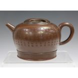 A Chinese Yixing stoneware teapot and cover, probably 20th century, the compressed circular body