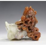 A Chinese two-tone agate brushwasher/spill vase, probably 20th century, the pale grey stone