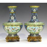 A pair of Chinese cloisonné vases, late 20th century, decorated with opposing panels of birds on