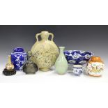 A collection of Oriental porcelain, mostly 20th century, including a Chinese famille rose oval dish,