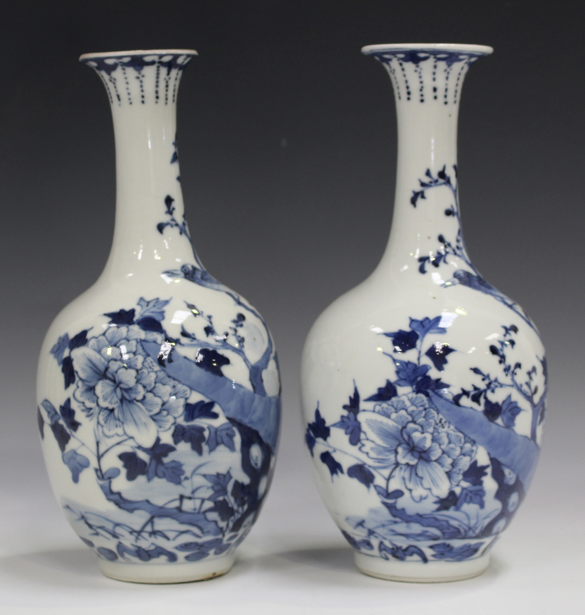 A pair of Chinese blue and white porcelain bottle vases, late 19th century, each ovoid body and - Image 11 of 13