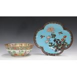 A Japanese cloisonné lobed oval dish, Meiji period, decorated with two birds flying above peonies