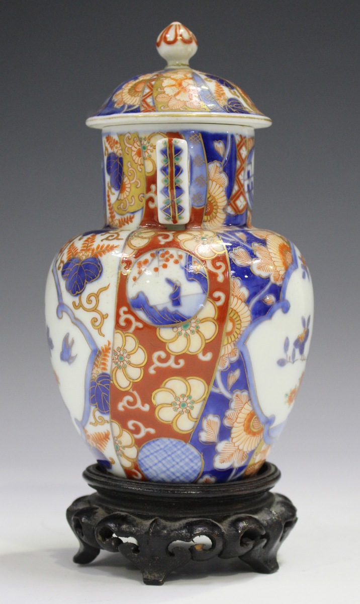 A Japanese Fukagawa Imari porcelain vase and cover, Meiji period, painted with panels of flowers, - Image 7 of 9