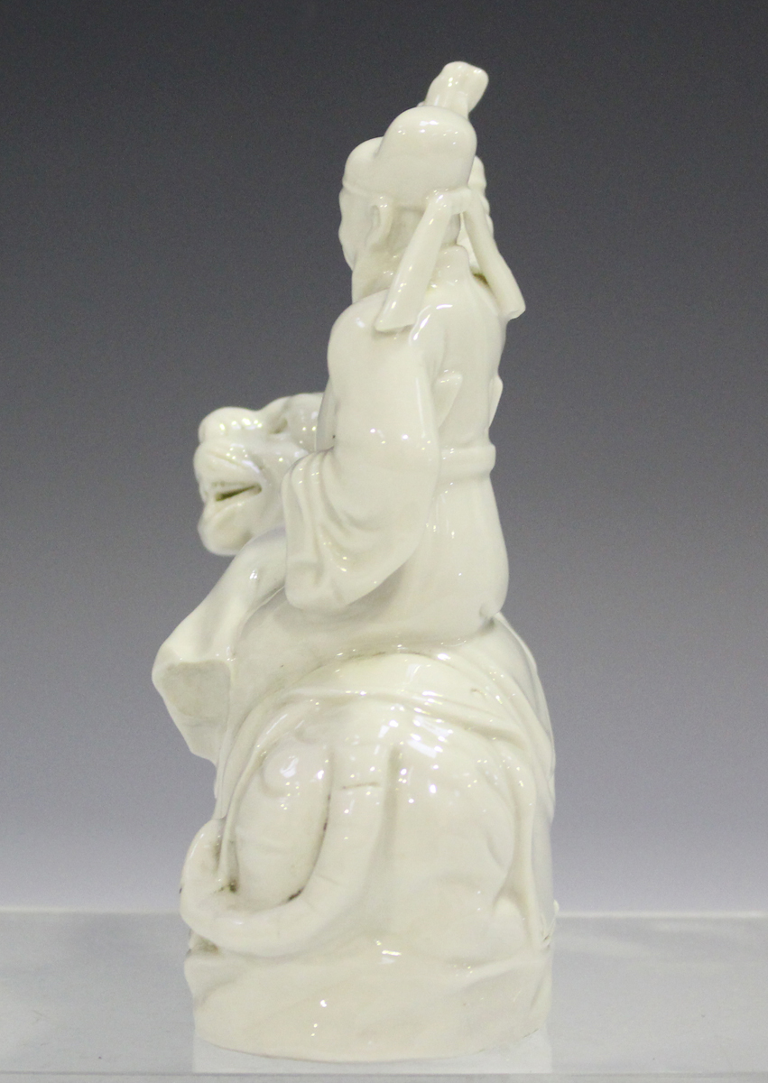 A Chinese blanc-de-Chine figure group, 20th century, modelled as an immortal seated on the back of a - Image 9 of 9