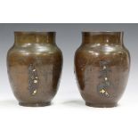 A pair of Japanese brown patinated bronze vases, Meiji period, each of swollen ovoid form, decorated