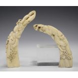 Two Japanese carved warthog tusk okimonos, Meiji period, each carved in relief with monkeys, lengths