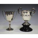 An Edwardian Irish silver two-handled trophy cup, the U-shaped body with horizontal girdle and