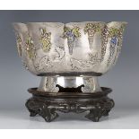 A Japanese silver and enamel lobed bowl, Meiji period, circa 1900, the stippled exterior finely