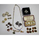 A silver and gilt two colour necklace, a pair of silver fronted cufflinks, mounted with copies of