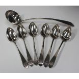 A harlequin set of six George III Scottish silver pointed Old English pattern tablespoons, three