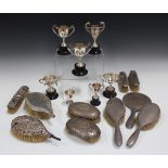 A small group of six silver trophy cups, heights ranging from 6.5cm to 11cm, together with a