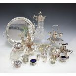 A mixed group of plated wares, including a three-light candelabrum, a cut glass claret jug, flatware