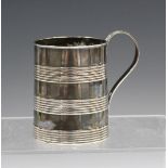 A George III silver tankard of slightly tapered cylindrical form with reeded horizontal banding