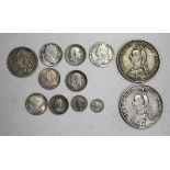 A group of British coins, comprising a George II Old Head shilling 1758, an Anne sixpence 1758, a
