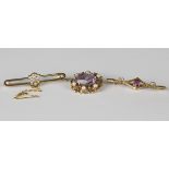 A gold, diamond and seed pearl bar brooch, detailed '585', fitted with a safety chain, width 2.