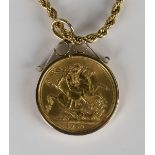 An Elizabeth II sovereign 1959, in a 9ct gold pendant mount with a gilt metal neckchain, detailed '