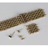 A 9ct gold wide oval link bracelet with a partly textured finish, on a snap clasp, length 18cm (some