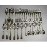 A George III and later part canteen of silver Fiddle pattern cutlery, comprising three