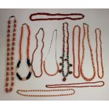 A collection of bead and other necklaces, including coral and freshwater cultured pearls.Buyer’s