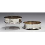 A pair of Elizabeth II silver wine coasters, London 1990 by John Bull Ltd, diameter 12.7cm.Buyer’s