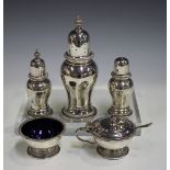 An Elizabeth II silver six-piece condiment set, comprising large sugar caster, pair of smaller