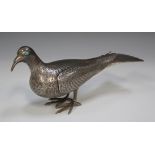 A Persian silver model of a dove with engraved plumage and inset turquoise eyes, marked to tail,