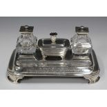 A Victorian silver inkstand, the rectangular stand with two pen depressions and engraved