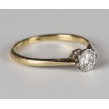 A gold, platinum and diamond single stone ring, claw set with a circular cut diamond, detailed 'Plat