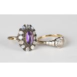 A gold and silver set, cabochon amethyst, marcasite and moonstone oval cluster ring, detailed '9ct',