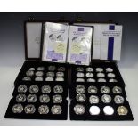A collection of forty-eight silver proof crown-size coins, struck in honour of HM Queen Elizabeth