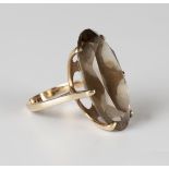 A 9ct gold ring, claw set with an oval cut smoky quartz, Birmingham 1972, ring size approx P1/2.