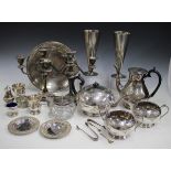 A group of assorted plated items, including a four-piece tea set and a silver handled knife.Buyer’