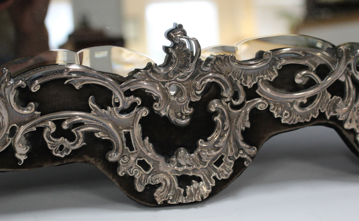 An Edwardian silver mounted dressing table mirror, the bevelled plate within a silver frame, - Image 5 of 7