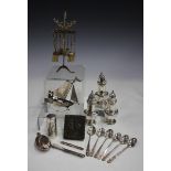 A collection of silver items, including a Victorian cylindrical scent bottle, engraved with birds