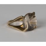 A 9ct gold ring, claw set with a circular cut smoky quartz, ring size approx L.Buyer’s Premium 29.4%