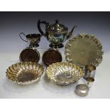 A collection of assorted plated items, including a pair of Christofle wrythen moulded circular