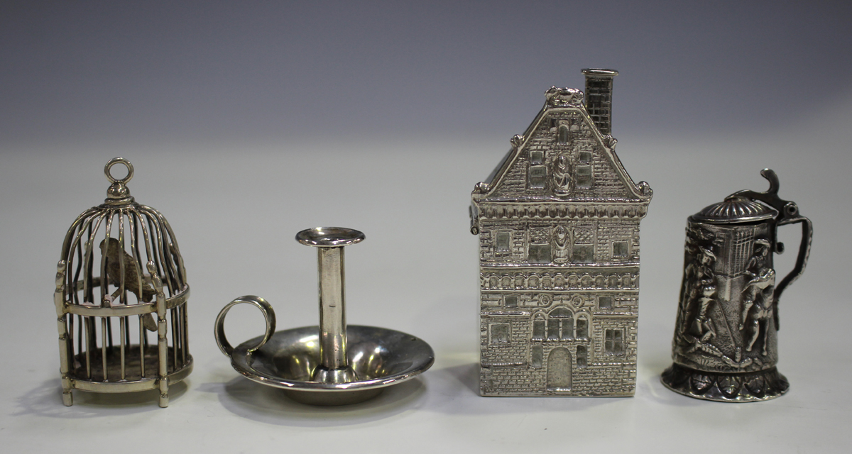 A late 19th century Dutch silver novelty box and cover, modelled in the form of a house, marked to