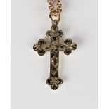 A gold pendant cross, detailed '9ct', length 3.2cm, with a 9ct gold circular link neckchain on a