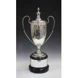 A George V silver two-handled trophy cup and cover, the U-shaped body inscribed 'Swaffham Coursing