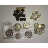 A group of British and foreign coins, including a George IV crown 1821, a Victoria Old Head crown