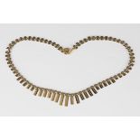 A 9ct gold collar necklace, the front in a graduated curved bar link design, on a boltring clasp,