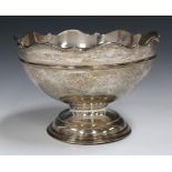 An Edwardian silver rose bowl with shaped rim and domed foot, London 1904 by Goldsmiths &