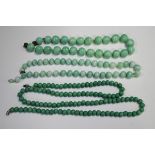 A group of Asian wares, comprising two malachite beads with carved and pierced decoration, a pair of