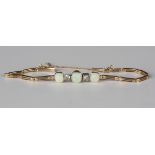 A gold, opal and diamond bracelet, the front collet set with three oval opals alternating with two
