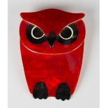 A Lea Stein Paris red, black and white plastic brooch, designed as an owl, length 6.2cm, width 4.