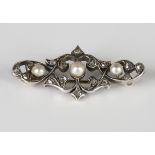 A gold backed and silver set, diamond and cultured pearl brooch, last quarter of the 19th century,