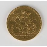 A Victorian Young Head sovereign 1873S with St George and the Dragon reverse.Buyer’s Premium 29.