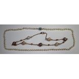 An Honora bronze and vari-coloured cultured pearl necklace, with a pouch and box, a single row